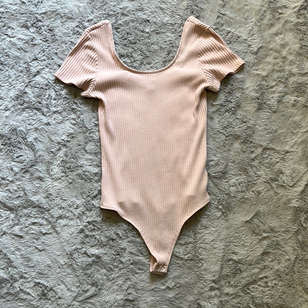 Size large, pink body suit